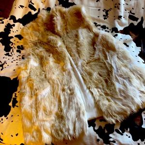 Cream colored fax fur vest